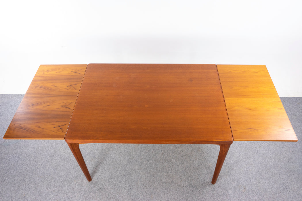 Danish Modern Teak Dining Table by Henning Kjearnulf- (327-108)