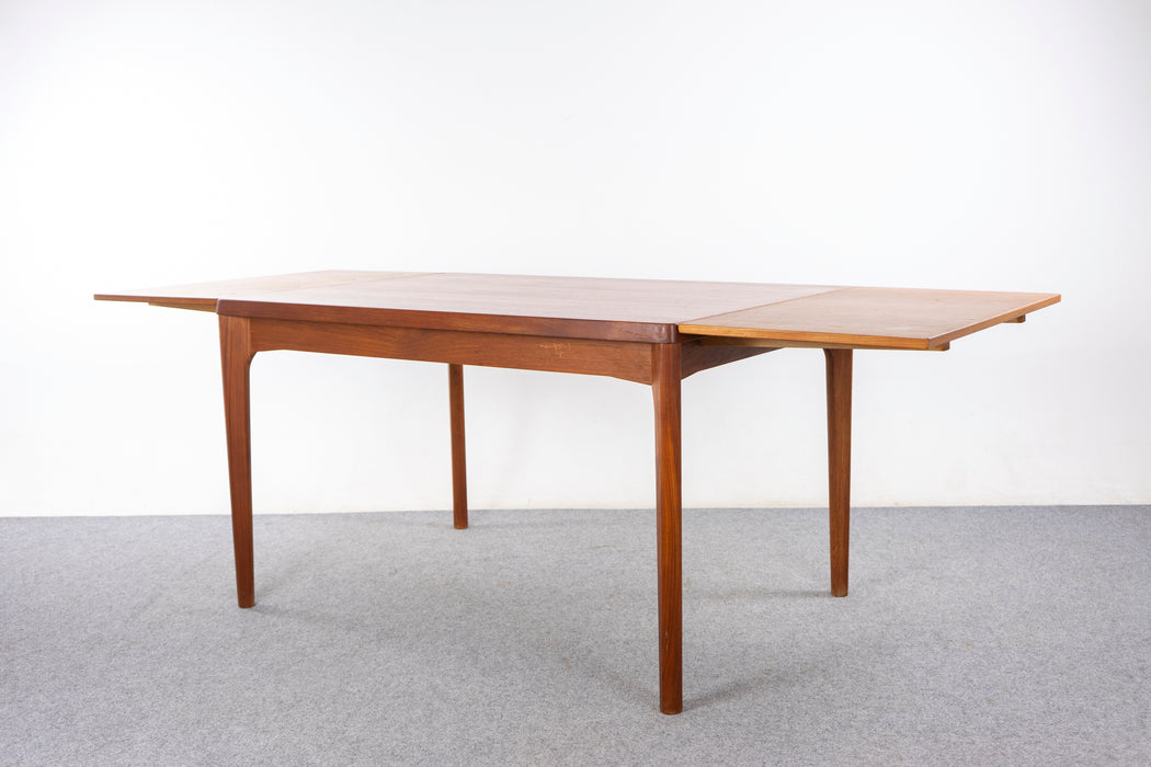 Danish Modern Teak Dining Table by Henning Kjearnulf- (327-108)