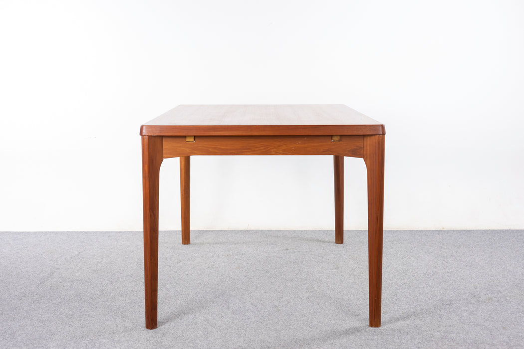 Danish Modern Teak Dining Table by Henning Kjearnulf- (327-108)