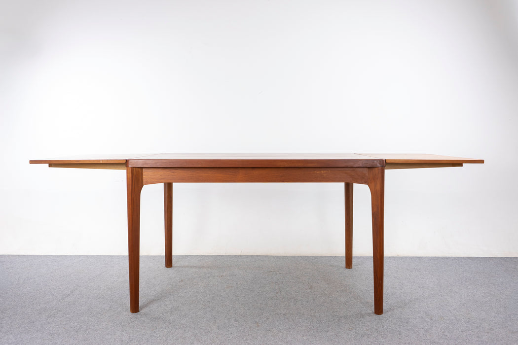 Danish Modern Teak Dining Table by Henning Kjearnulf- (327-108)