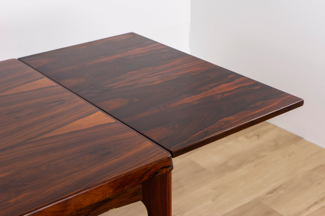 Danish Modern Rosewood Dining Table by Henning Kjaernulf - (326-103)